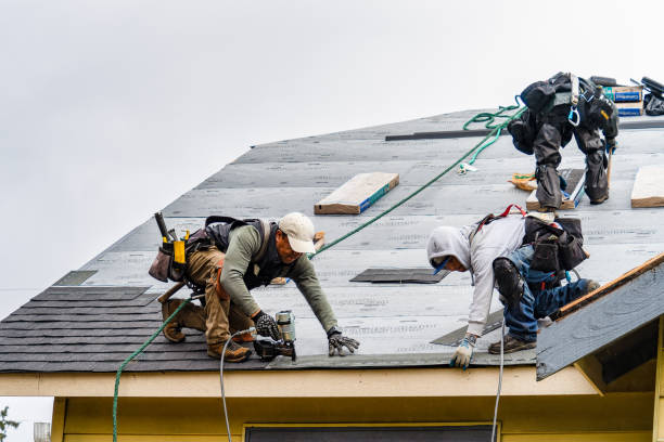 Professional Gutter Installation technician working in Monroe Bridge, MA